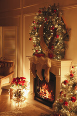 Fireplace with Christmas stockings in beautifully decorated living room