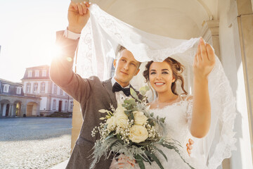 caucasian happy romantic young couple celebrating their marria