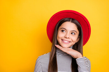 Poster - Portrait of attractive cheerful long-haired girl touching chin creating idea copy space isolated over bright yellow color background