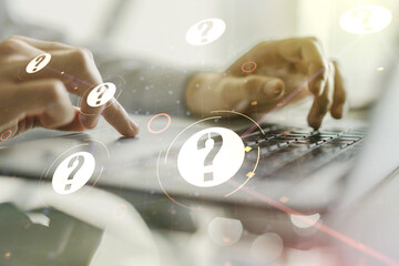 Creative abstract question mark sketch and hands typing on computer keyboard on background, FAQ and research concept. Double exposure