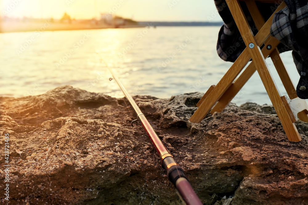Fishing in river on summer day