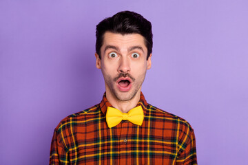 Canvas Print - Portrait of attractive amazed stunned funky guy wearing checked shirt opened mouth isolated over violet purple color background