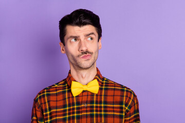 Sticker - Photo of attractive thoughtful young guy wear plaid shirt looking empty space isolated violet color background