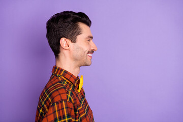 Sticker - Profile photo of cheerful positive guy look empty space shiny smile wear bow tie plaid shirt isolated violet background