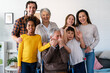 Multi Generation, multiethnic Family at home together with grandparents