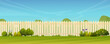 Fence and green lawn, rural landscape background. Vector garden backyard with wooden hedge, trees and bushes, grass and flowers, park plants. Spring summer outside landscape. Farm natural agriculture