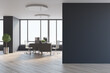 © Who is Danny - Blank black wall in spacious office hall with city view from big window, wooden tables and floor, tree in a metallic flowerpot and stylish lamps on top. 3D rendering, mock up