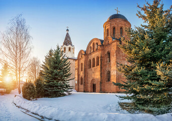 Wall Mural - The Church of Peter and Paul and the Church of Varvara surrounded by green fir trees in Smolensk