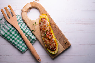 Canvas Print - Stuffed zucchini with meat, tomato and grilled cheese 