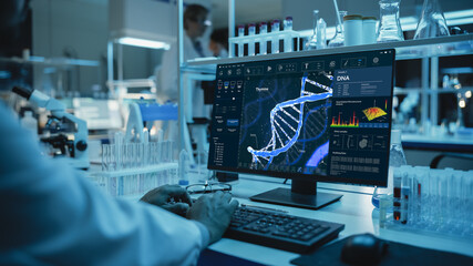 Wall Mural - medical research scientist working on desktop computer with gene analysis software in modern science