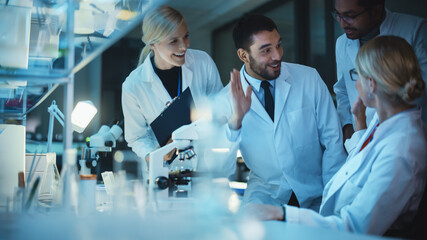 Wall Mural - surprized female reseach scientist makes an important discovery while researching samples under the 