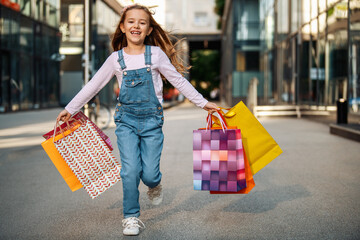 Girl with many shopping bags