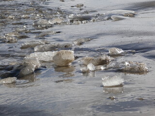 Glistening ice chunk on the beach, Bay of Gdansk, Poland