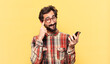 young crazy bearded man thinking expression and holding a phone