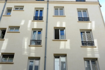 Wall Mural - Parisians facades during a sunny day. march 2021, Paris France.