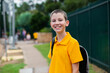 © Clare Seibel-Barnes/Austockphoto - Happy Aussie public school boy with bag ready to go back to school