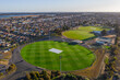 © Gary Chapman/Austockphoto - Aerial view of a series of AFL football ovals amongst suburban housing