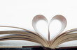 © Chris Hackett/Tetra Images - Book with pages folded in heart shape