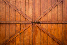 Wooden Farmhouse Barn Or Food Granary Doors Made Of Planks And Boards At Farm.
