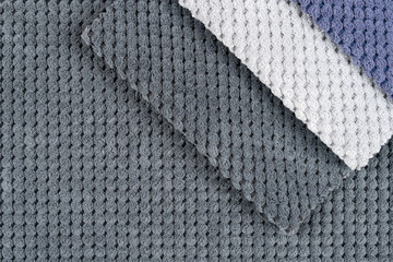 Wall Mural - Close-up of a gray textured fabric. Macro shot of gray upholstery for furniture.