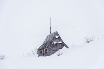 Wall Mural - Beautiful winter views of the High Tatra Mountains with tourists, skiers and amazing states of nature