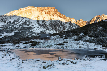 Wall Mural - Beautiful winter views of the High Tatra Mountains with tourists, skiers and amazing states of nature