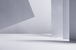 © finepoints - Abstract geometric white grey minimalist background with perspective of walls, stripes and flying paper in light and shadow as border, copy space.