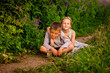 © Ekaterina - happy children in light clothes on the path in the park, a summer concept and a happy free childhood