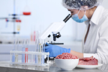 Wall Mural - scientist proceeding quality control in laboratory. meat analysis
