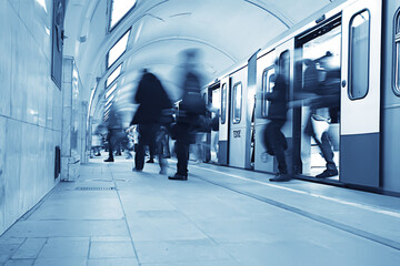 Wall Mural - crowd of people metro in motion blurred, abstract background urban traffic people