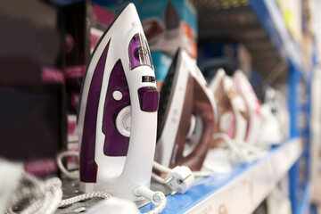 Irons on display in   home appliance store