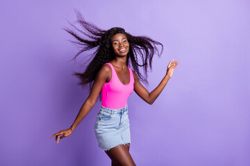 Sticker - Photo of sweet shiny dark skin woman dressed pink tank top dancing air wind blowing isolated violet color background