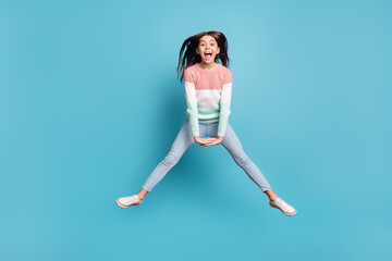 Canvas Print - Full length photo of young preteen girl happy positive smile active energetic jump up isolated over blue color background