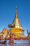 Fototapeta Most - Wat Phra That Doi Suthep with clear blue sky and evening sunlight, the most famous temple in Chiang Mai, Thailand