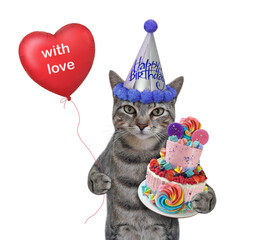 Wall Mural - A gray cat in a party hat with a holiday cake and a red balloon celebrates a birthday. White background. Isolated.