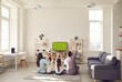 © Studio Romantic - Football match, leisure and happy family sport fan pastime together. Excited parent with overjoyed children watching soccer game on tv sitting on floor carpet in living room at home. Rear view