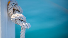 Mooring Rope Tied On Dock Ship