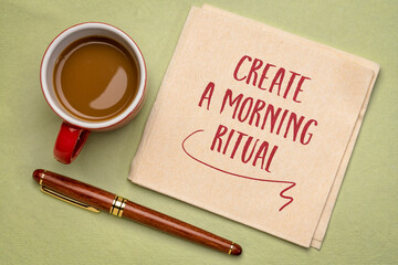 Wall Mural - create a morning ritual - inspirational handwriting on a napkin with a cup of coffee, lifestyle and personal development concept