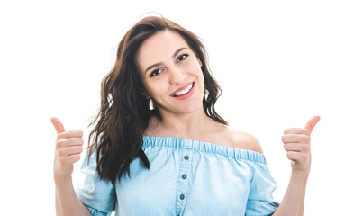 Young woman with thumbs up, like concept, isolated on white background. Yes gesturing, sings of good work