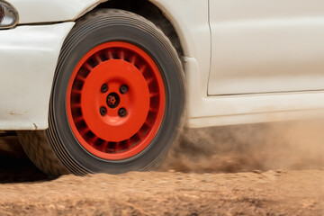 Wall Mural - Rally race car drifting on dirt track.