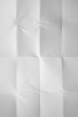 Wall Mural - Unfolded folded white paper background in vertical