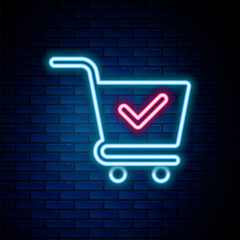 Sticker - Glowing neon line Shopping cart with check mark icon isolated on brick wall background. Supermarket basket with approved, confirm, done, tick, completed symbol. Colorful outline concept. Vector