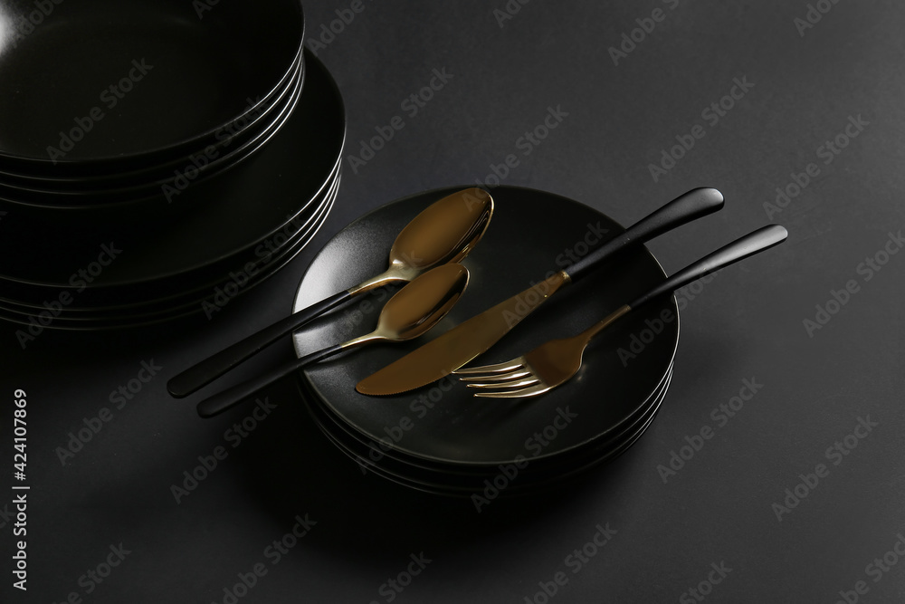 Stylish table setting on dark background