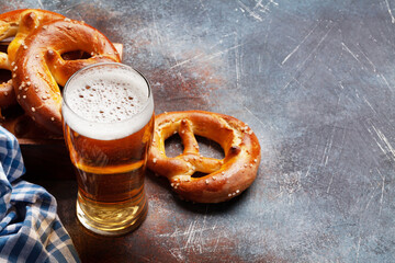 Wall Mural - Lager beer mug and fresh baked homemade pretzel