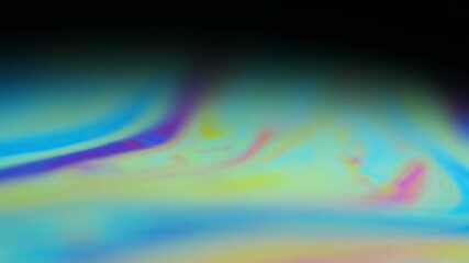 Sticker - Close up rotating colorful rainbow bubble on black background. Abstract backdrop