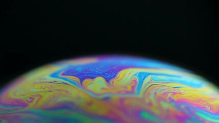 Sticker - Rotating colorful rainbow bubble on black background. Abstract backdrop