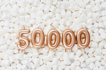 Wall Mural - 50000 followers card. Template for social networks, blogs. Background with white marshmallows. Social media celebration banner. 50k online community fans. 50 fifty thousand subscriber