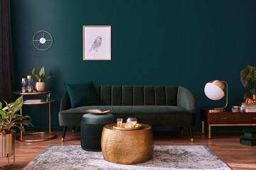 Luxury living room in house with modern interior design, green velvet sofa, coffee table, pouf, gold decoration, plant, lamp, carpet, mock up poster frame and elegant accessories. Template.