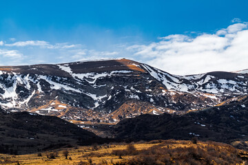 Wall Mural - Mountain peaks covered with snow