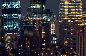 Tokyo City lights night scene. The night lightings of skyscrapers at Shiodome, Minato Ward. Tokyo. Japan